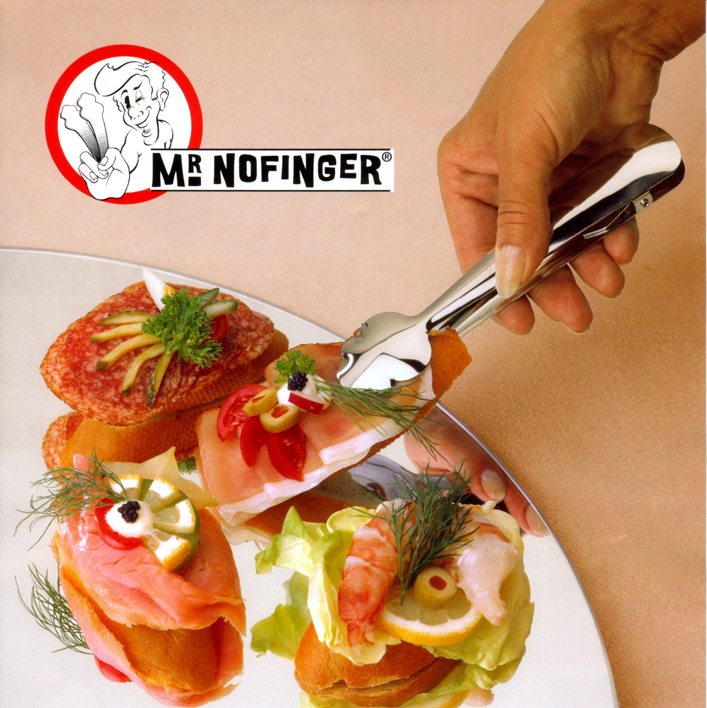 Canapés served with the stainless steel tong